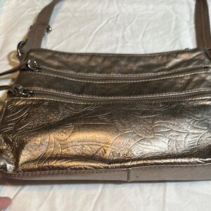 The Sak Brown Shoulder Bag with Embossed Detailing